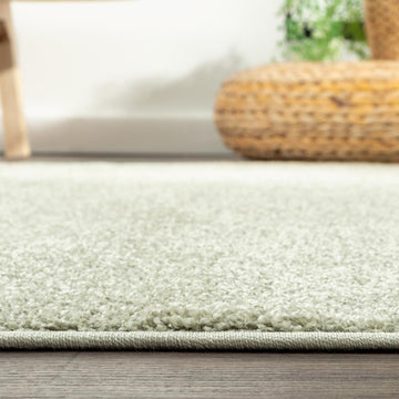 Haze Solid Low-pile Area Rug Green